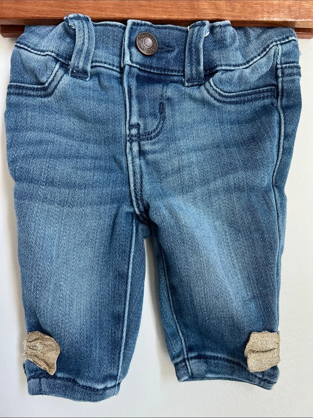 OshKosh B'gosh | Baby Blue Denim Jeans with Gold Bow Hem Detail Size 3 Months